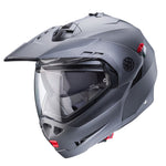 Caberg Adventure Mc-Hjälm Tourmax X Grå med robust design, integrerat visir och ventilationssystem. Perfekt för touring och off-road körning.